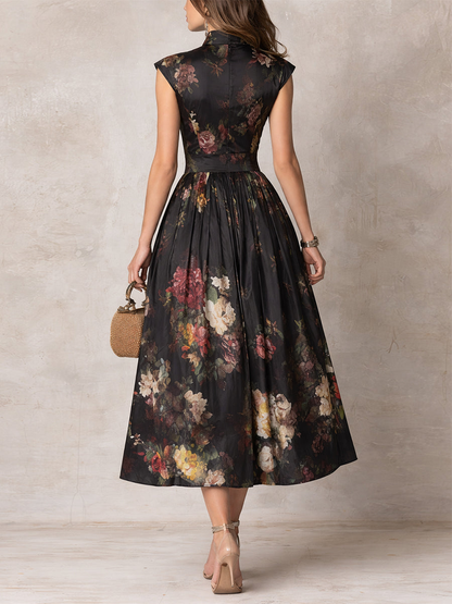 Violetta - Robe midi noire en satin plissé à motif floral et encolure à trou de serrure